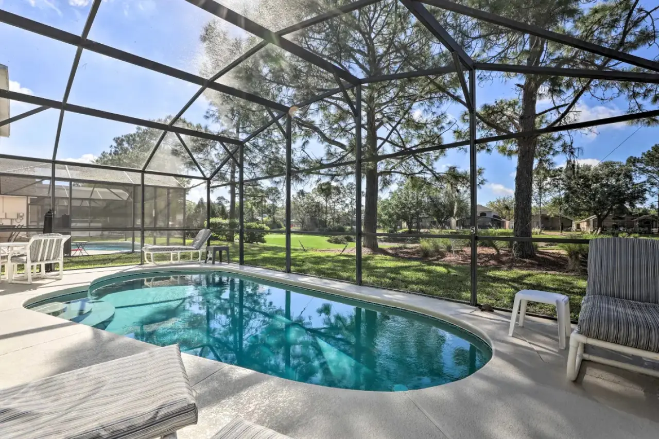 Fairway Oasis private pool overlooking a green golf course